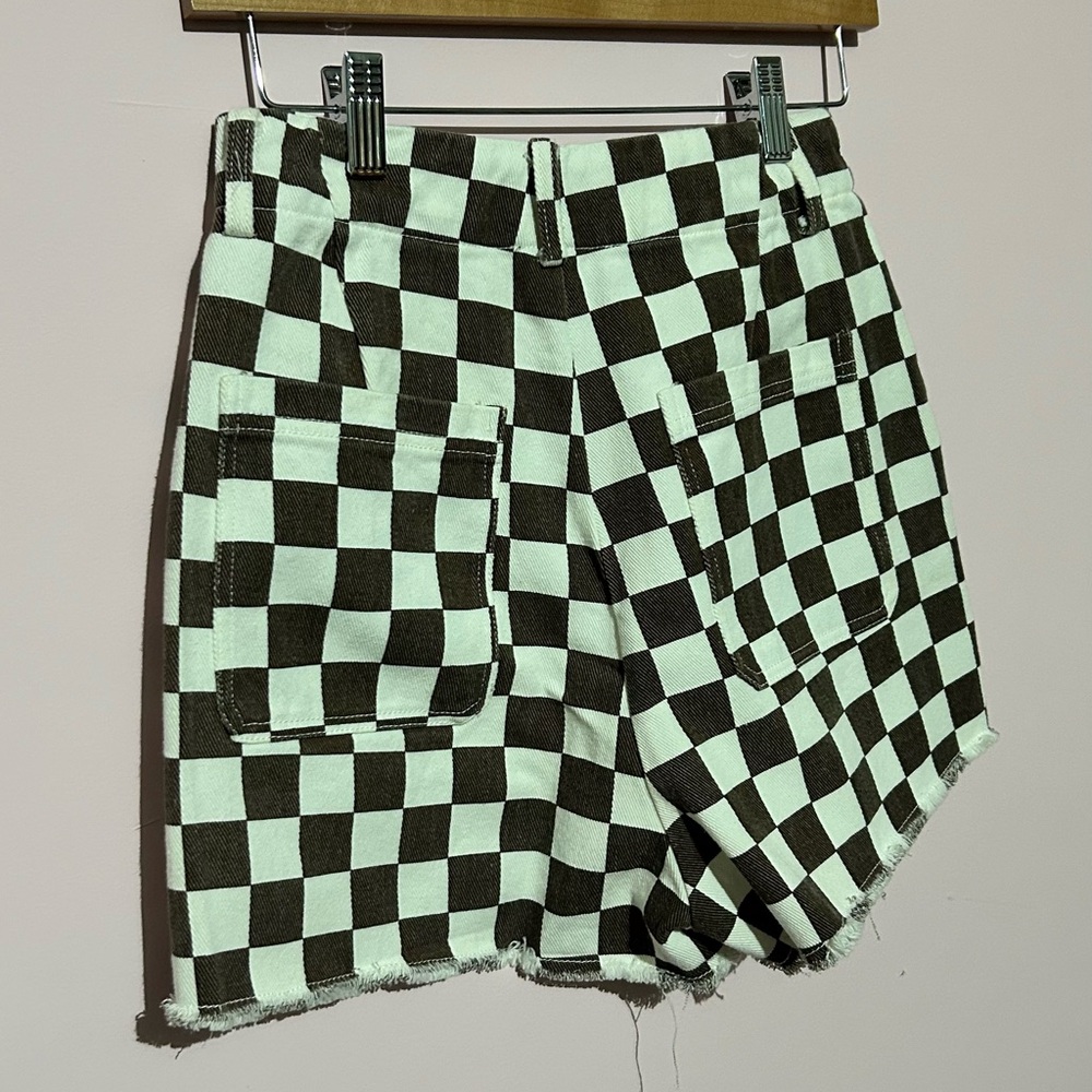 Brand new denim fabric, checkered shorts with some fringe on bottom